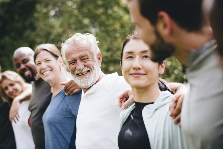 happy diverse people together in the park
